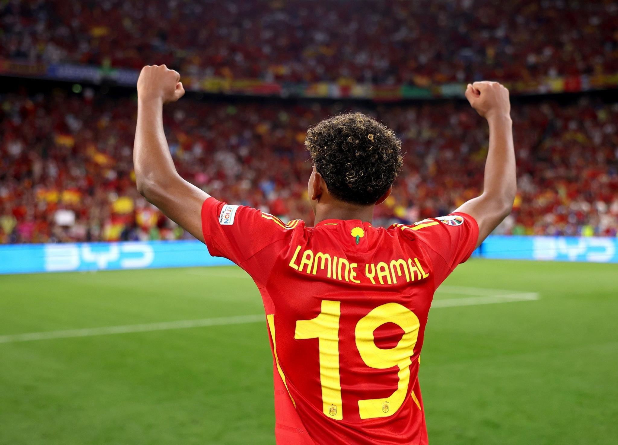 Lamine Yamal celebrates Spain's victory over France in the Euro 2024 semi-finals