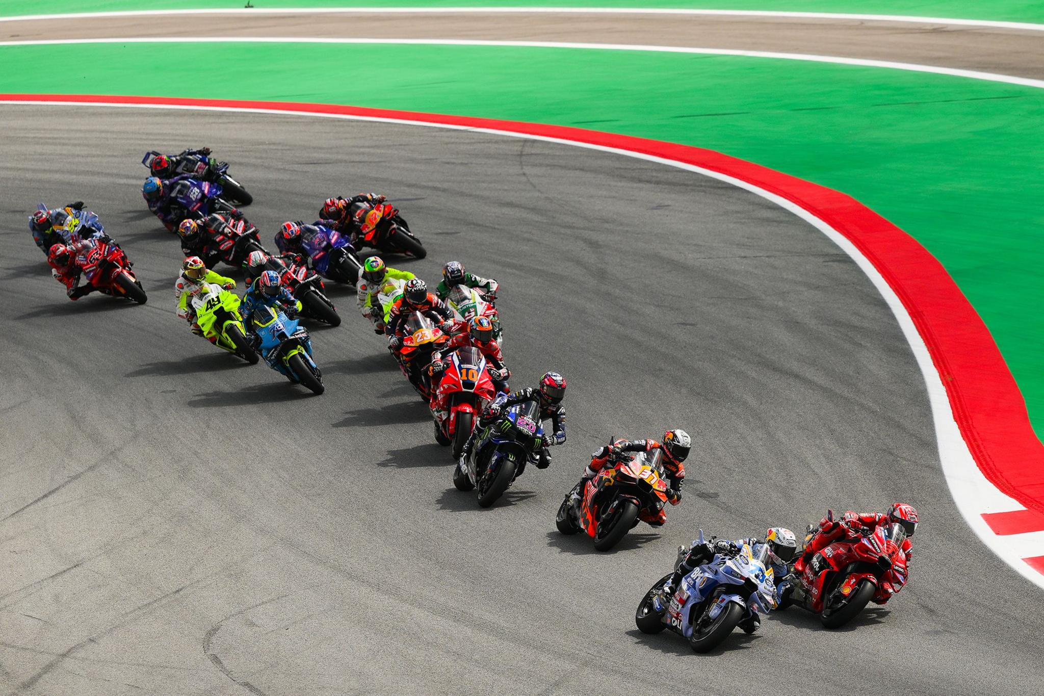 Spain's Alex Marquez leads Marc Marquez to win the Monster Energy MotoGP Grand prix at Circuit de Barcelona-Catalunya in Barcelona, Spain. Photo by David Ramos