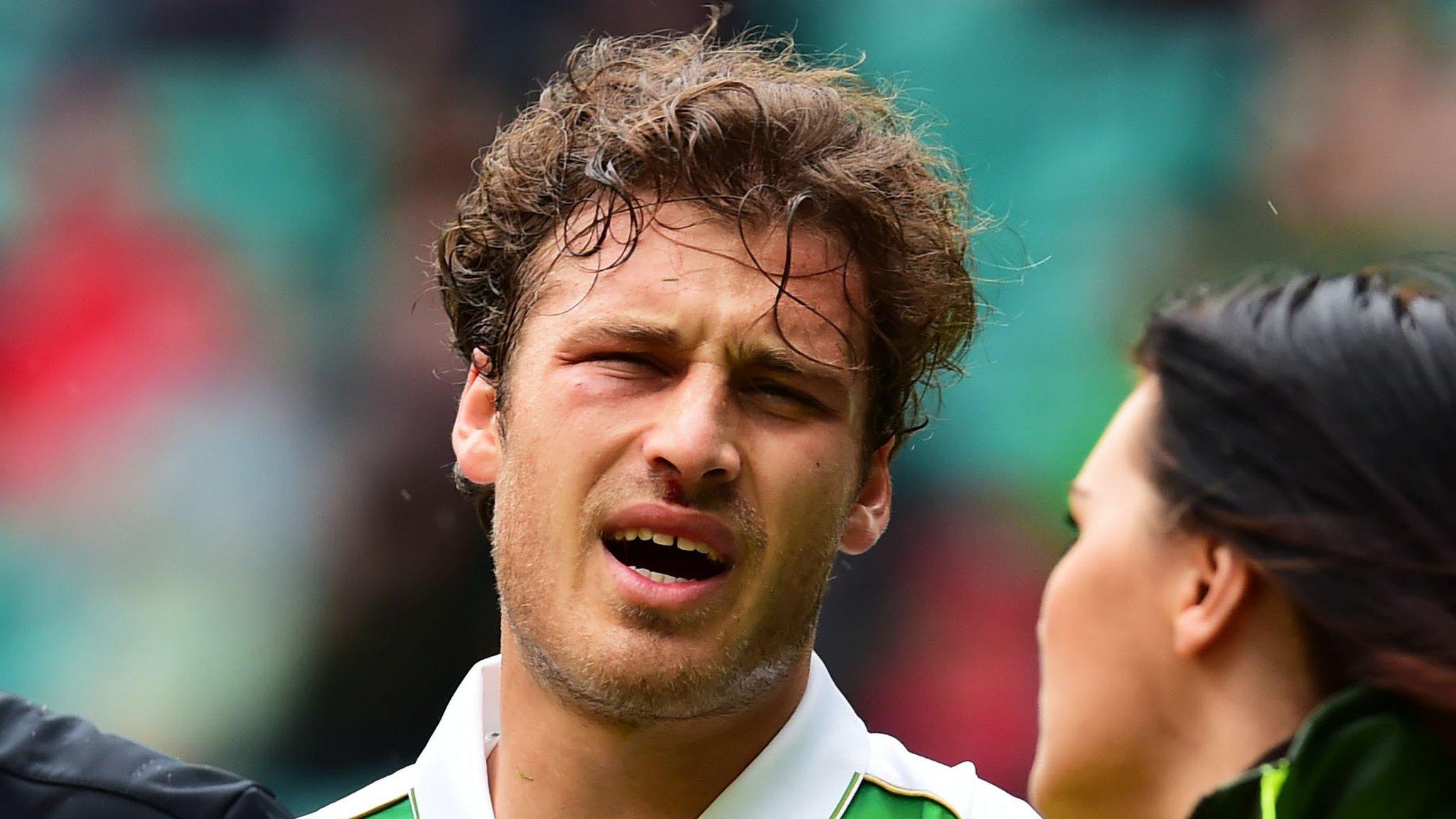 Celtic's Erik Sviatchenko goes off injured