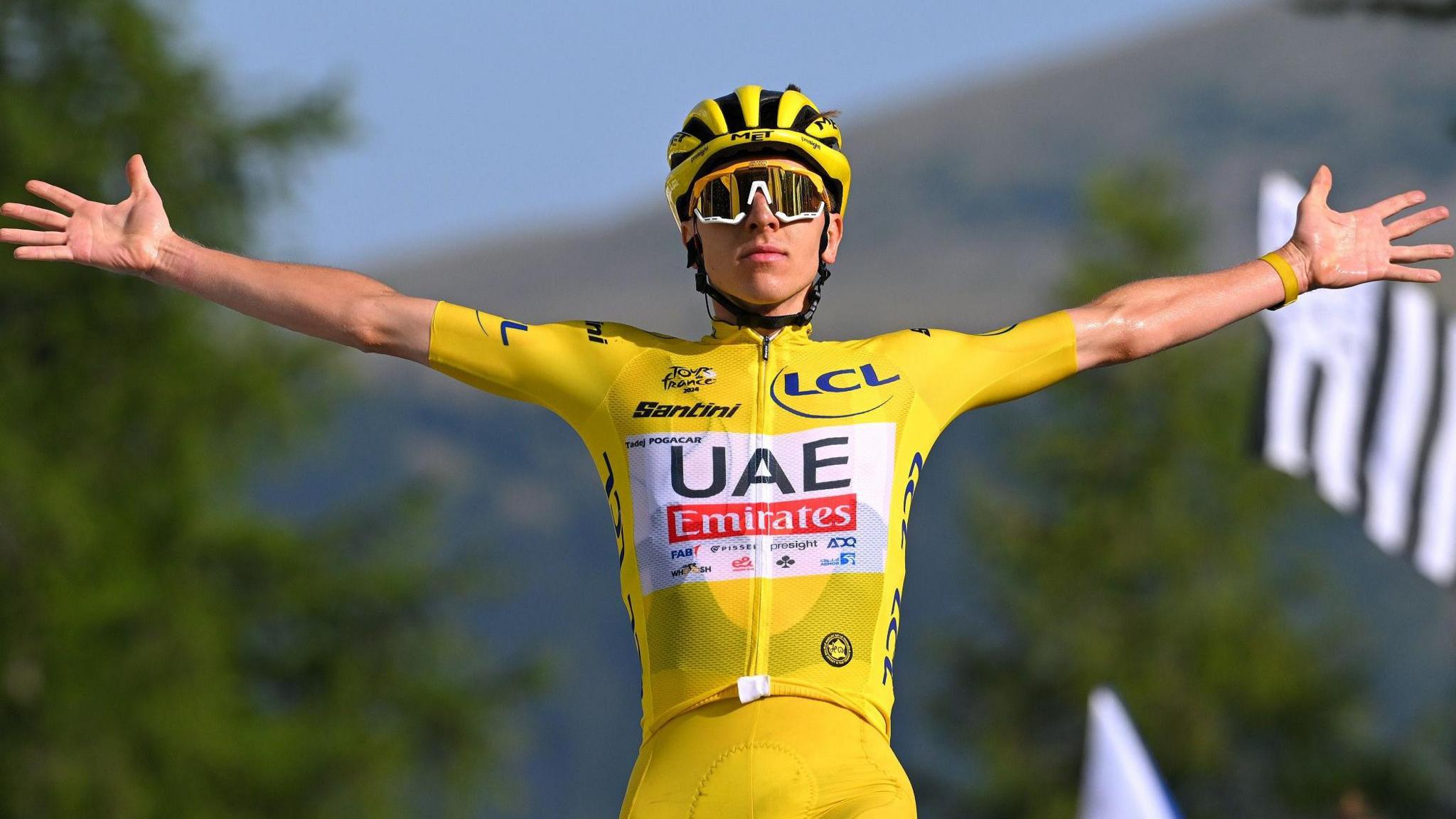 Tadej Pogacar celebrates winning a stage at the 2024 Tour de France