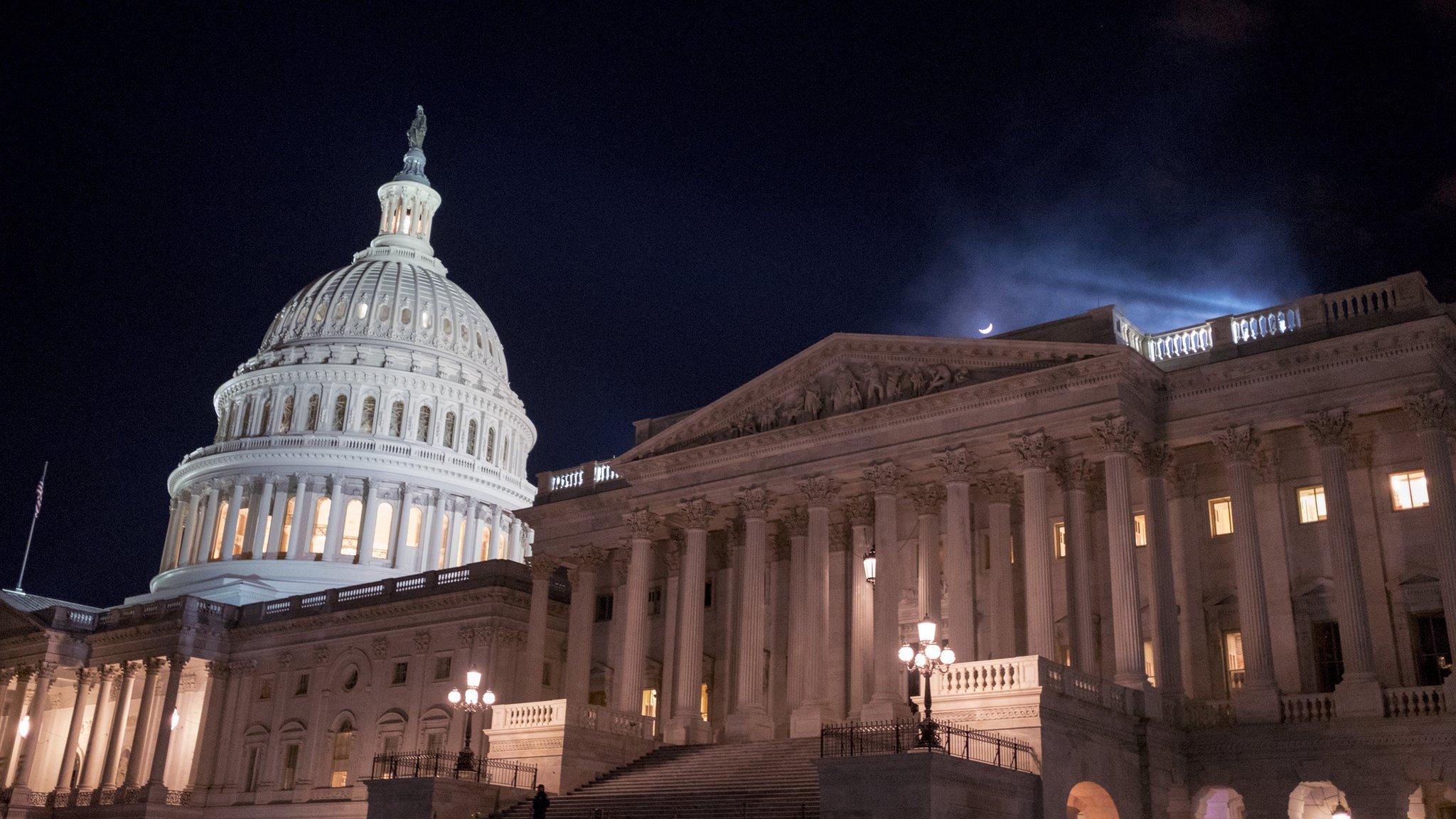 Night view of Capitol Hill on January 21, 2018 in Washington, DC. The U.S. government is shut down after the Senate failed to pass a resolution to temporarily fund the government through February 16 on January 21, 2018 in Washington, DC