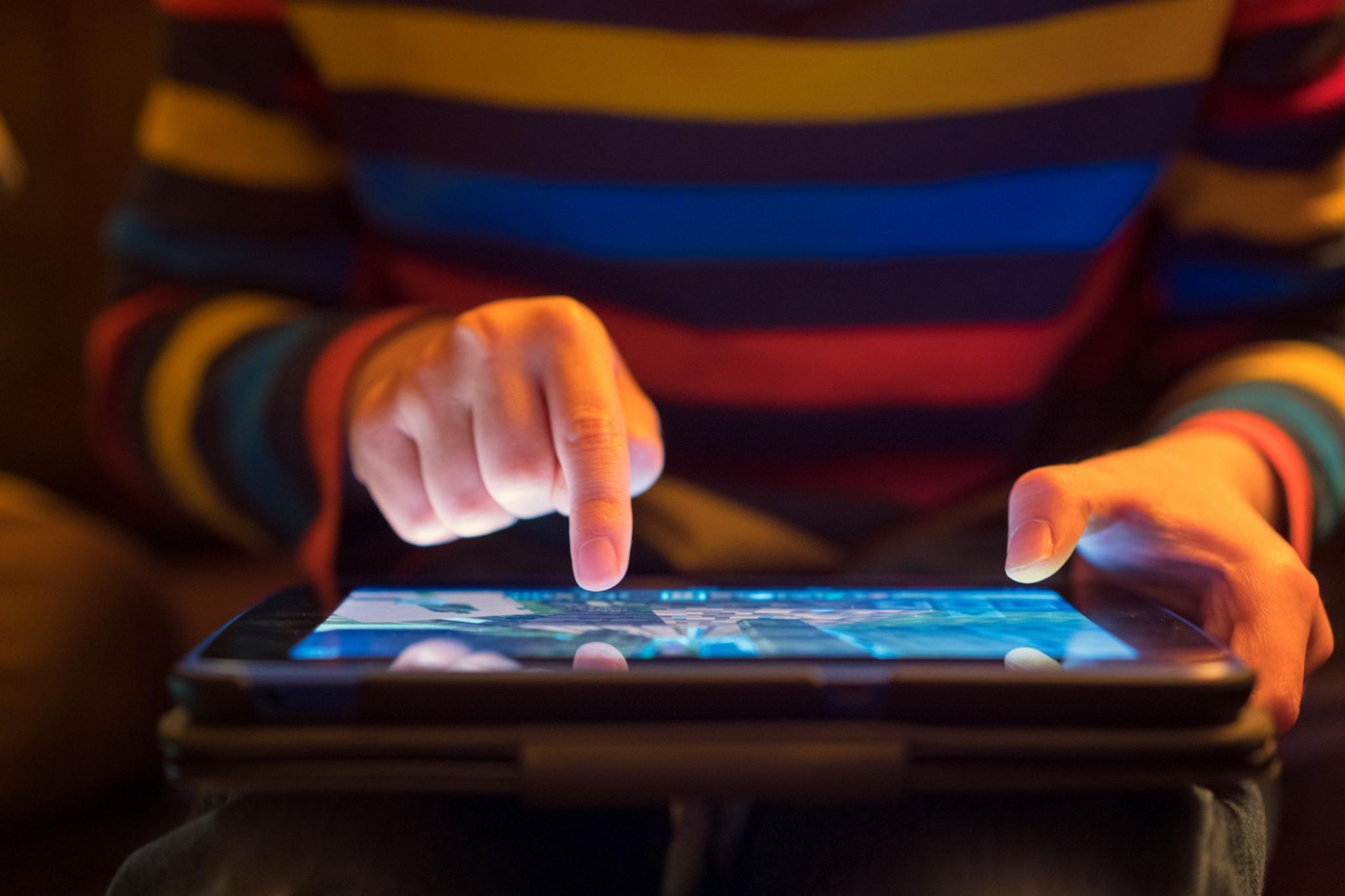 Child using a tablet.