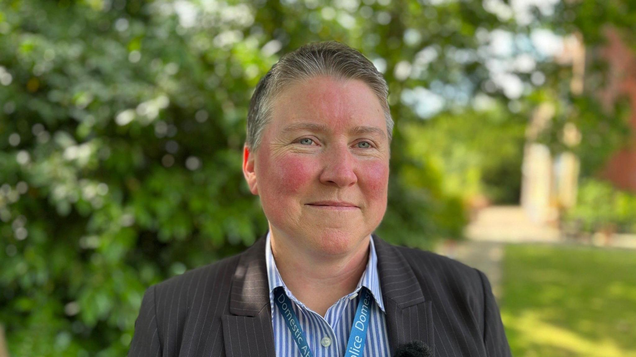 Debbie Crouch outside Surrey Police headquarters