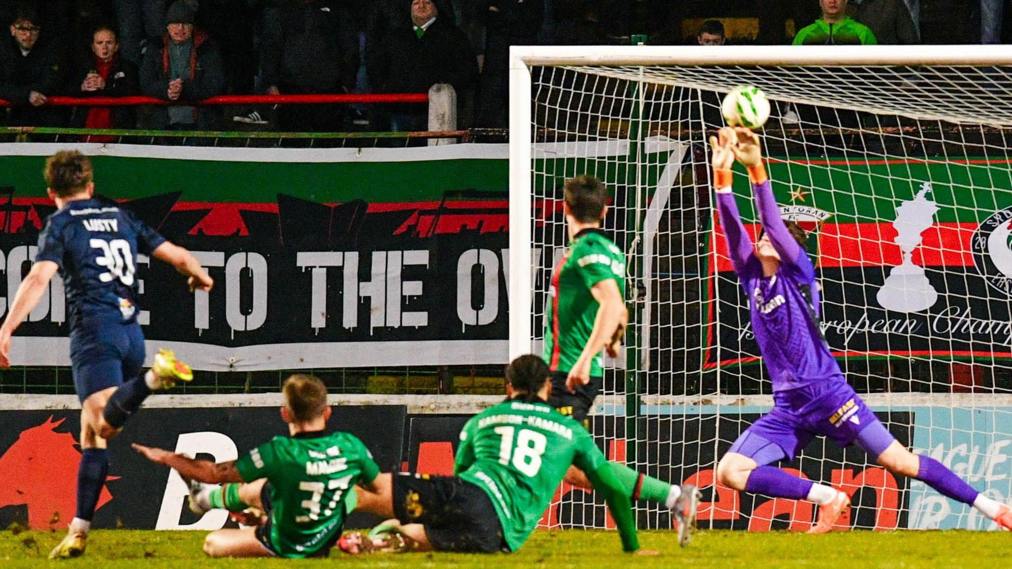 Andrew Mills makes a save