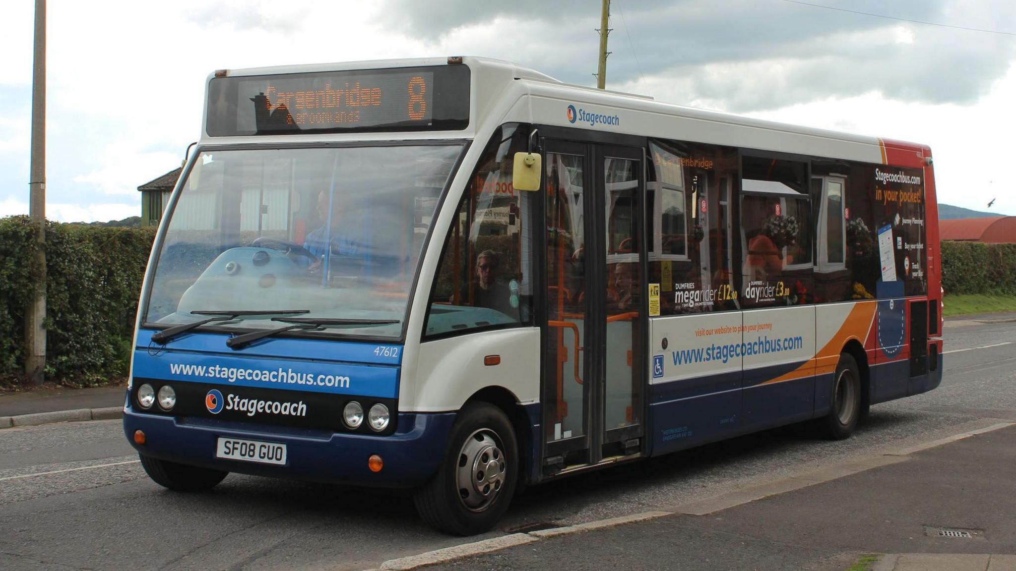 A small Stagecoach bus for Cargenbridge heads through the countryside near Dumfries