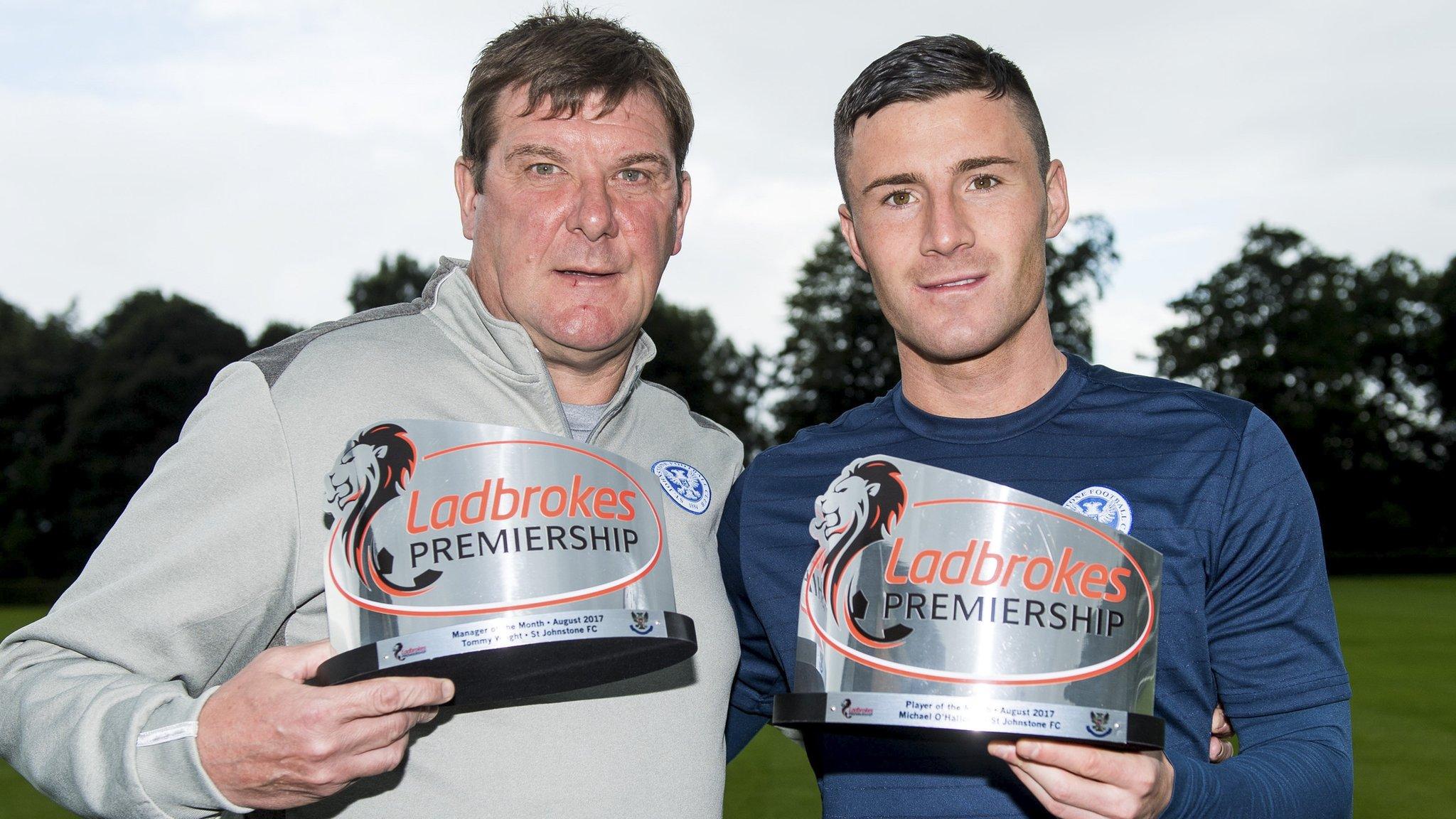 Tommy Wright and Michael O'Halloran show off their awards