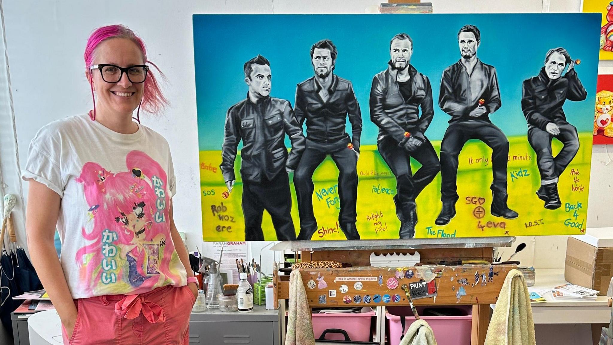 Sarah Graham with her painting of Take That from 2012