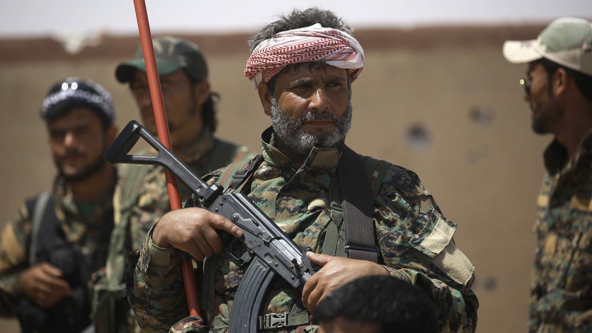 Syrian Democratic Forces (SDF) fighters in the village of Hazima, Syria (6 June 2017)