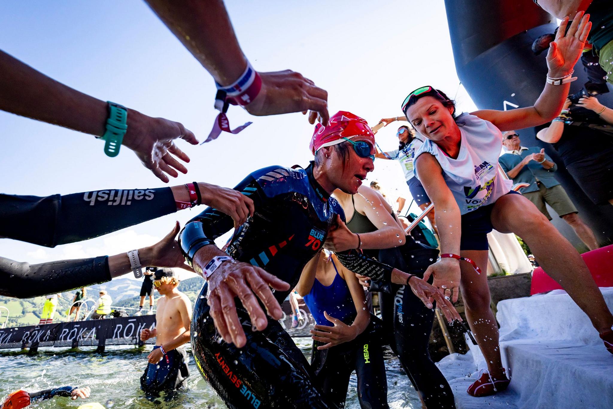 Athletes compete in the swim leg during the 2025 IRONMAN 70.3 Zell am See-Kaprun in Zell am See, Austria. Photo by Jan Hetfleisch