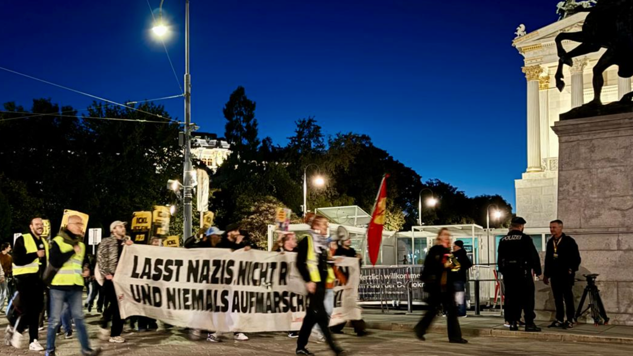 Protesters carrying anti-Nazi banners appeared outside parliament in Vienna 