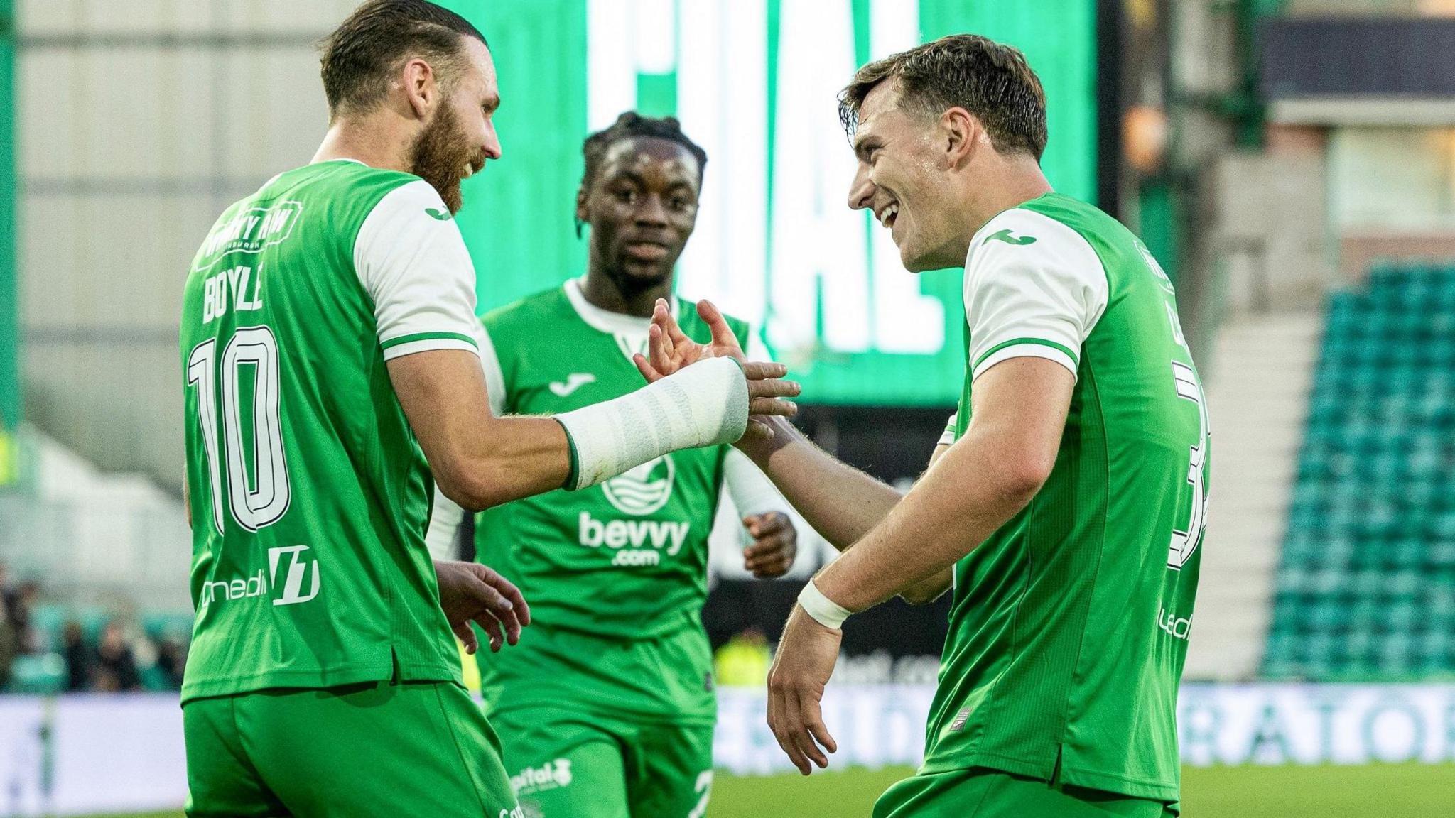 Hibs' Martin Boyle (left) celebrates