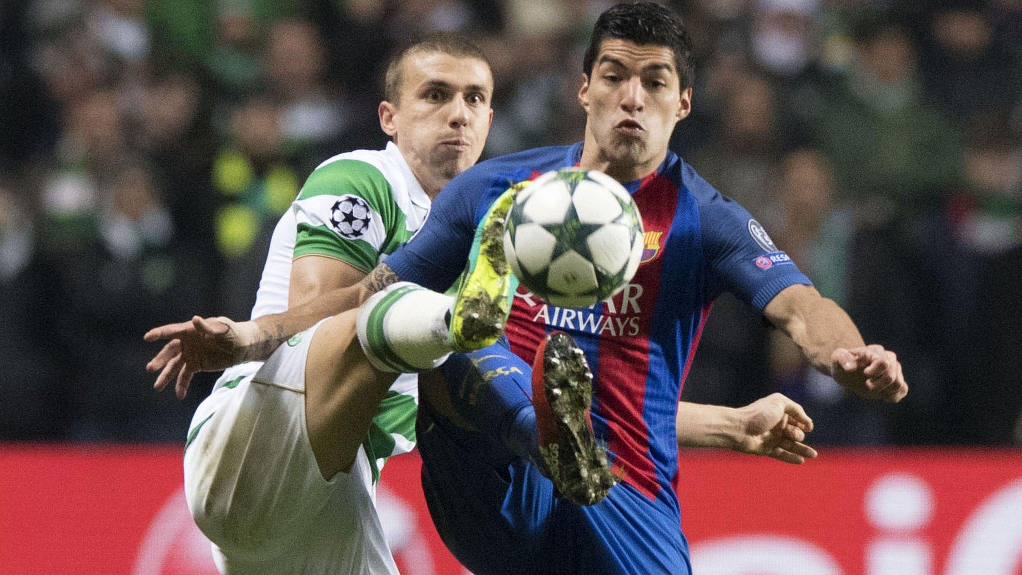 Celtic's Jozo Simunovic and Barcelona's Luis Suarez