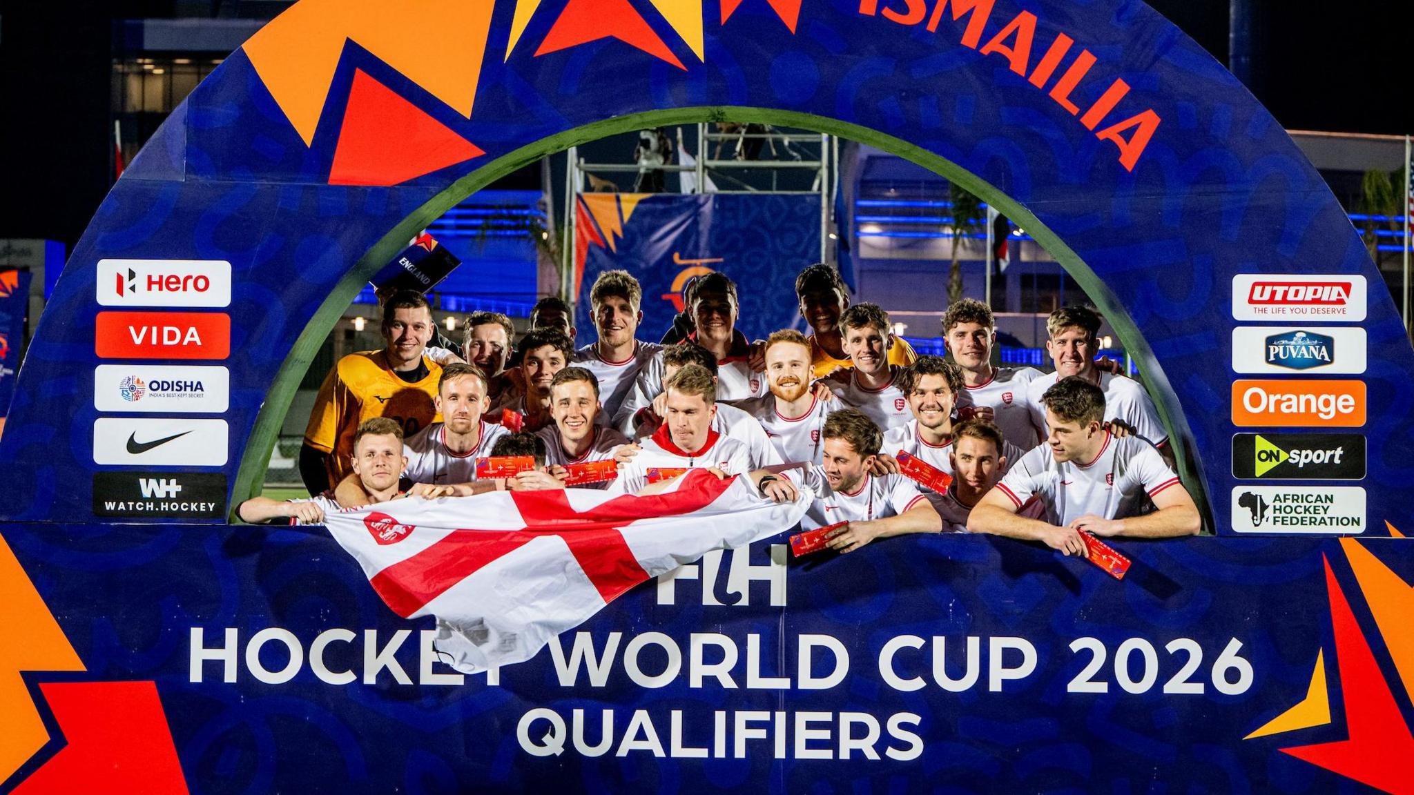 Group photograph of England's men's team celebrating their tournament win