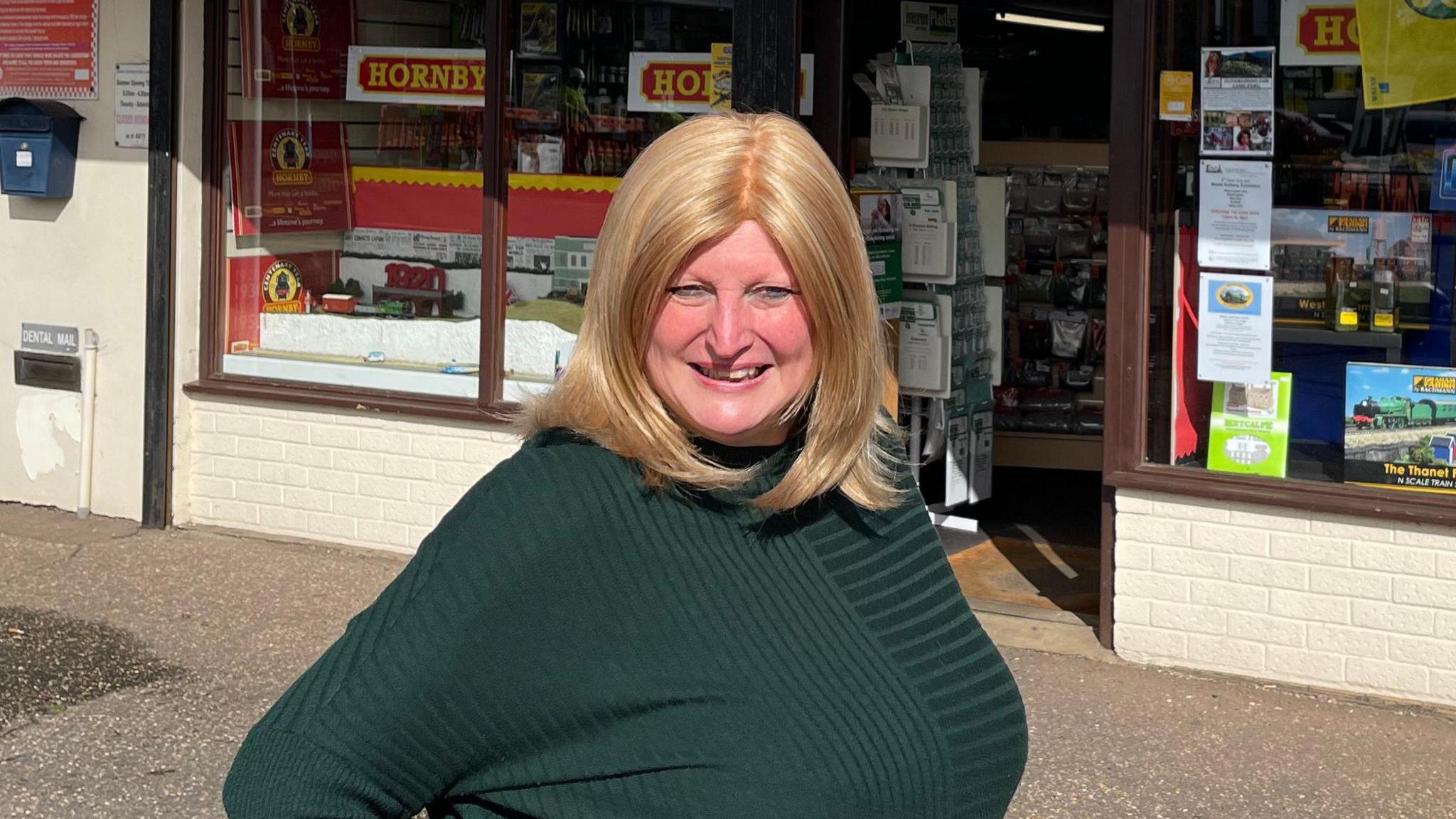Anne Martin standing outside in front of the Great Eastern Model Railways shop in Heartsease.