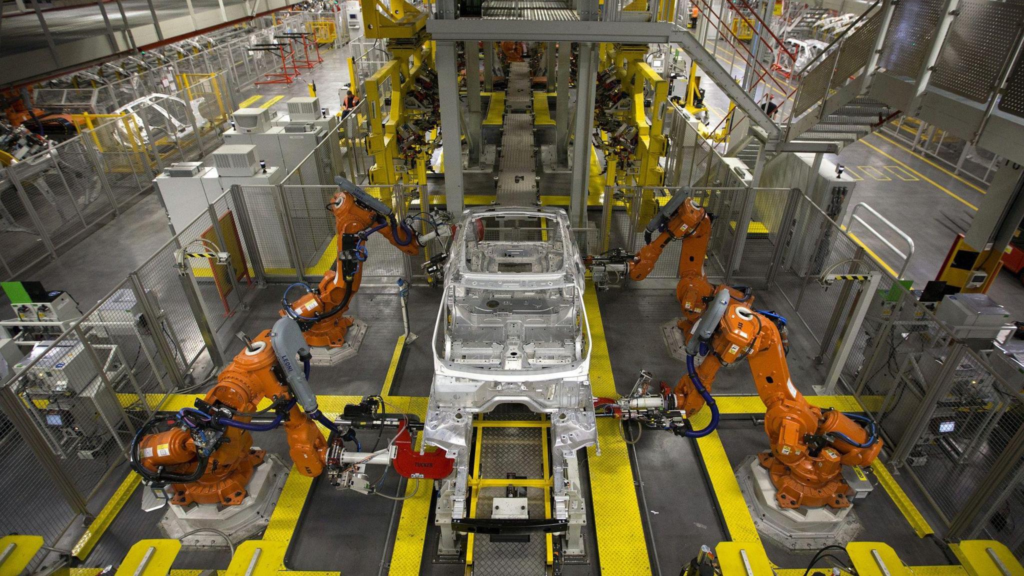 A robotic car assembly line in a factory