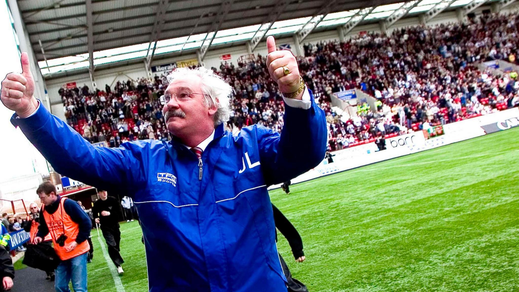 Jim Leishman celebrates a 5-0 win as Dunfermline caretaker manager against Dundee