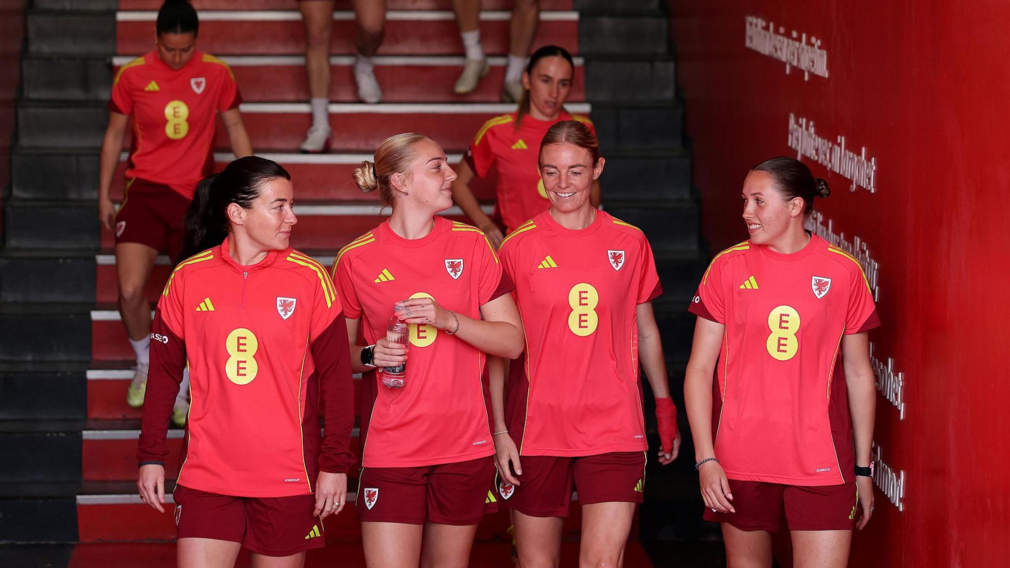 Angharad James, Mayzee Davies, Sophie Ingle and Mared Griffiths measurement retired to train astatine nan Elbasan Arena successful Elbasan