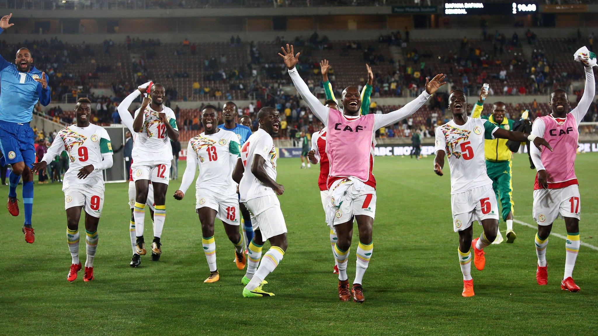 Senegal celebrate their victory over South Africa in Durban