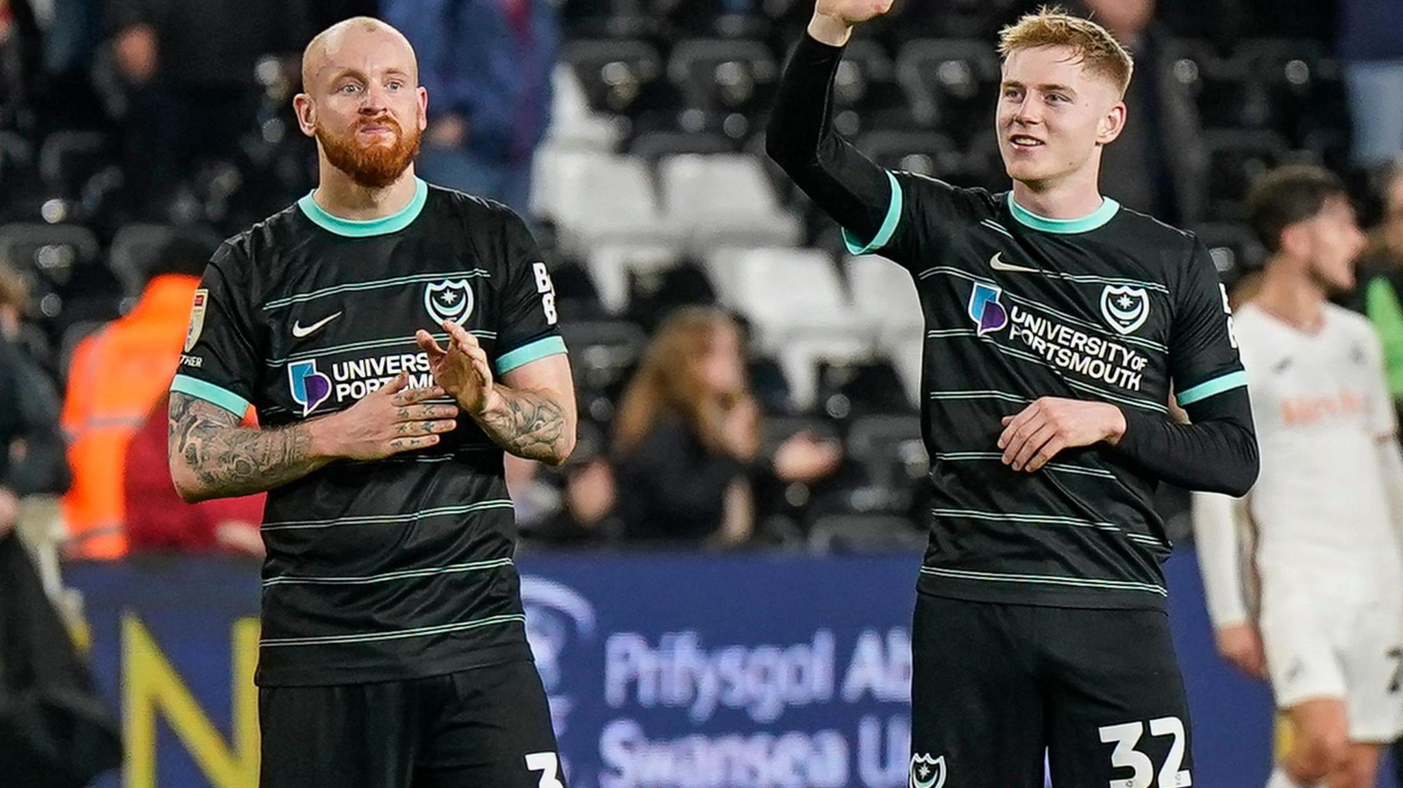 Portsmouth's Connor Ogilvie and Paddy Lane after the 2-2 draw at Swansea