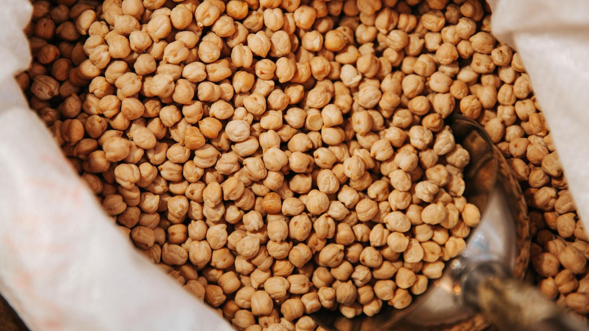 A bowl of dried chickpeas.