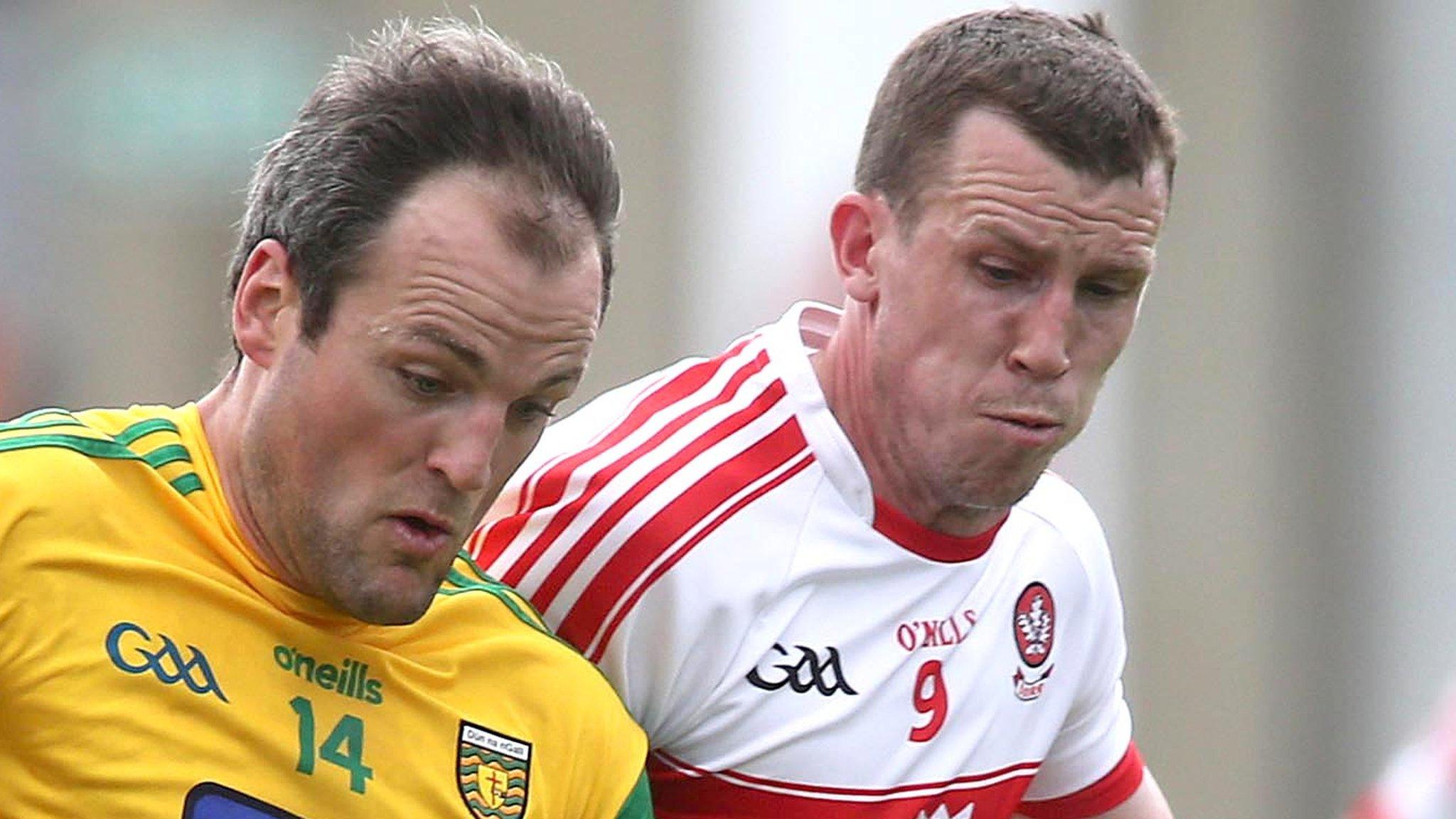 Donegal's Michael Murphy battles with Derry's Michael Bateson at Celtic Park