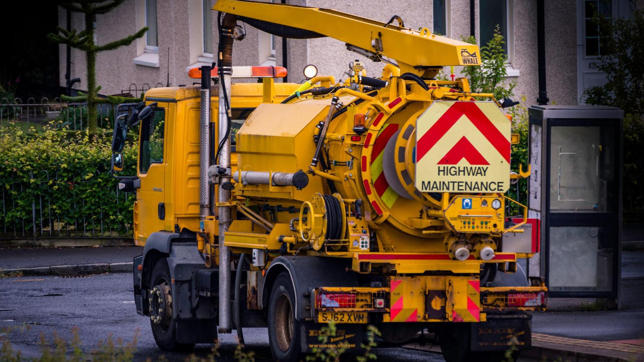 A yellow council lorry clearing drains in Kilmarnock, East Ayrshire