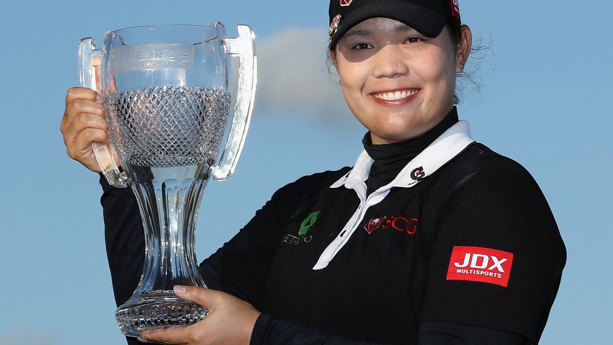 Ariya Jutanugarn with the Tour Championship trophy