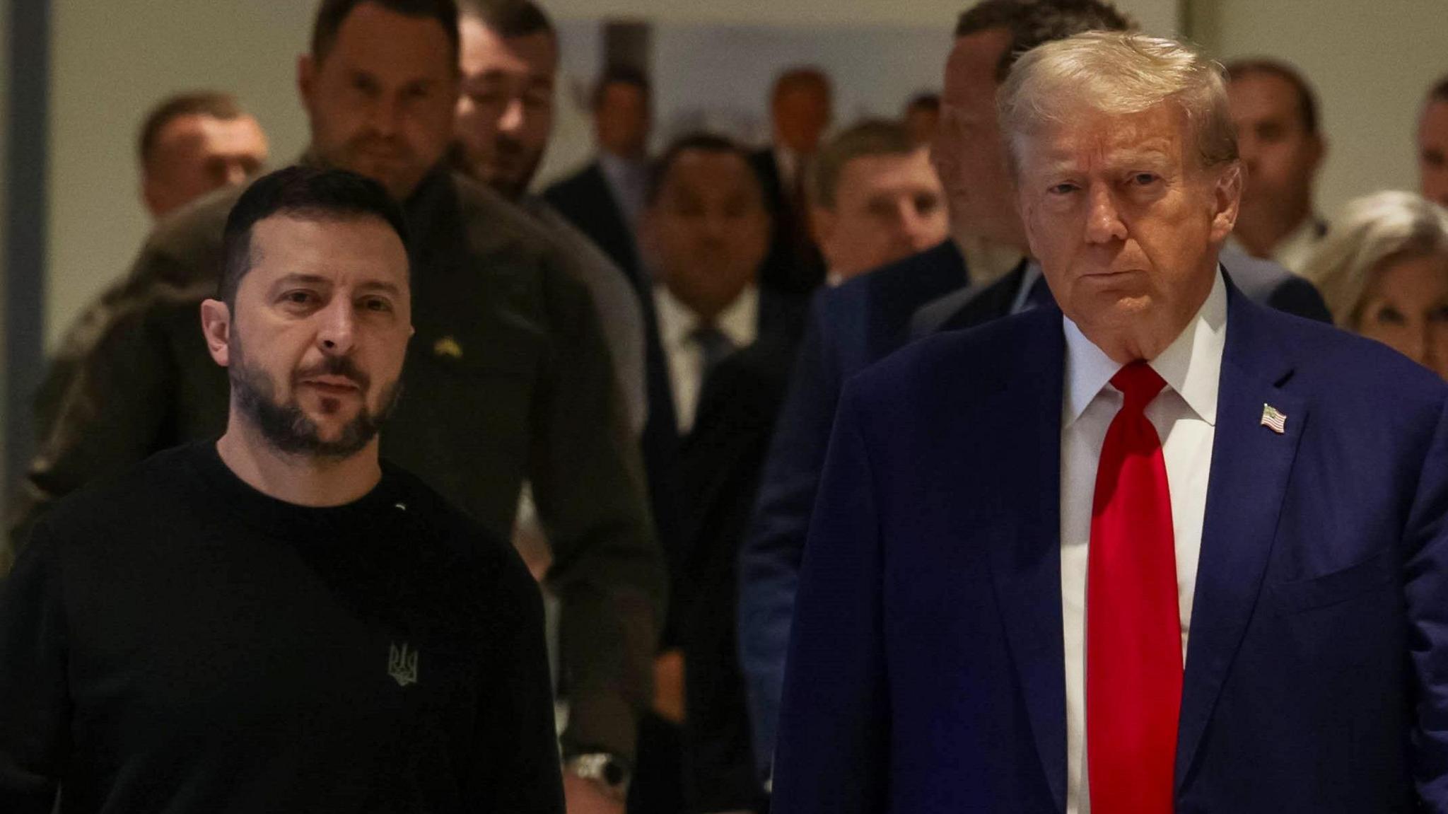 Ukrainian President Volodymyr Zelensky walks alongside President-elect Donald Trump ahead of a meeting between the two in New York in September.