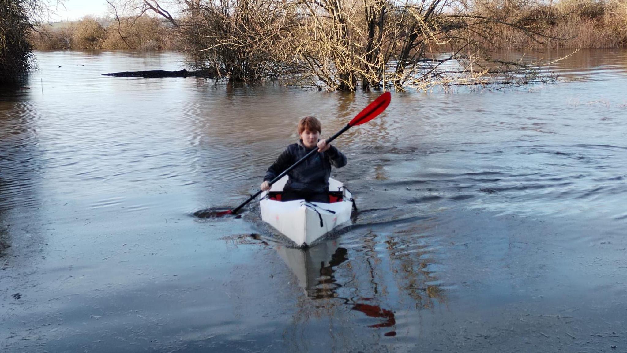 Kayak on a flooded farm