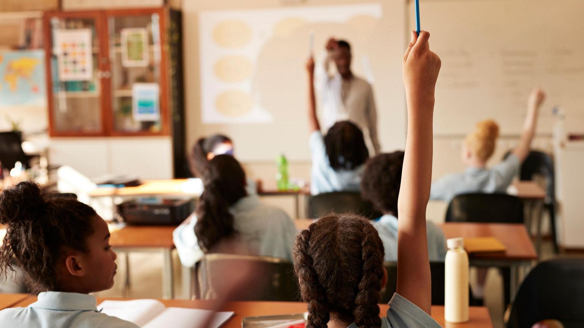 Fewer schools and 'cashless' meals in education reform plans