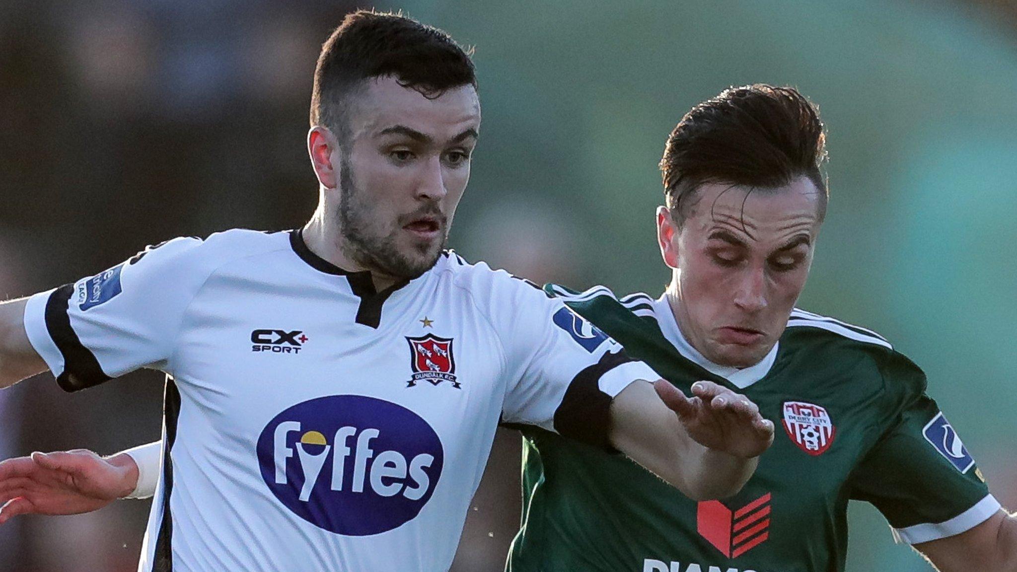 Dundalk's Michael Duffy and Aaron McEneff of Derry City