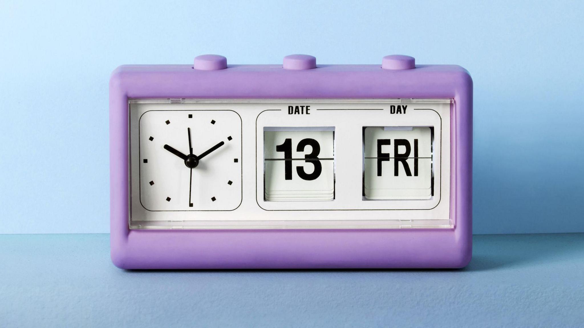 Friday 13th showing on a purple clock