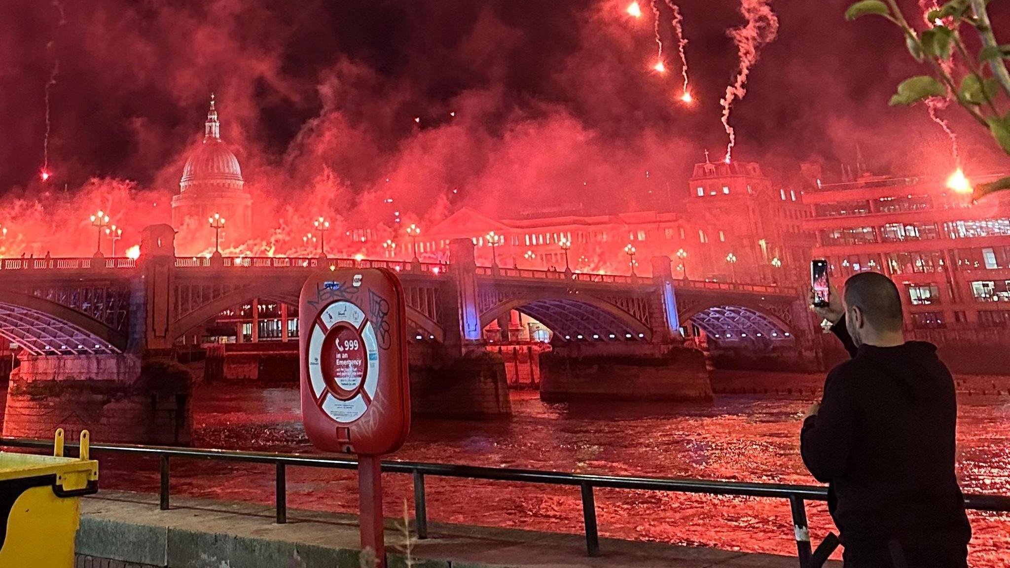 Fireworks being released from a London bridge