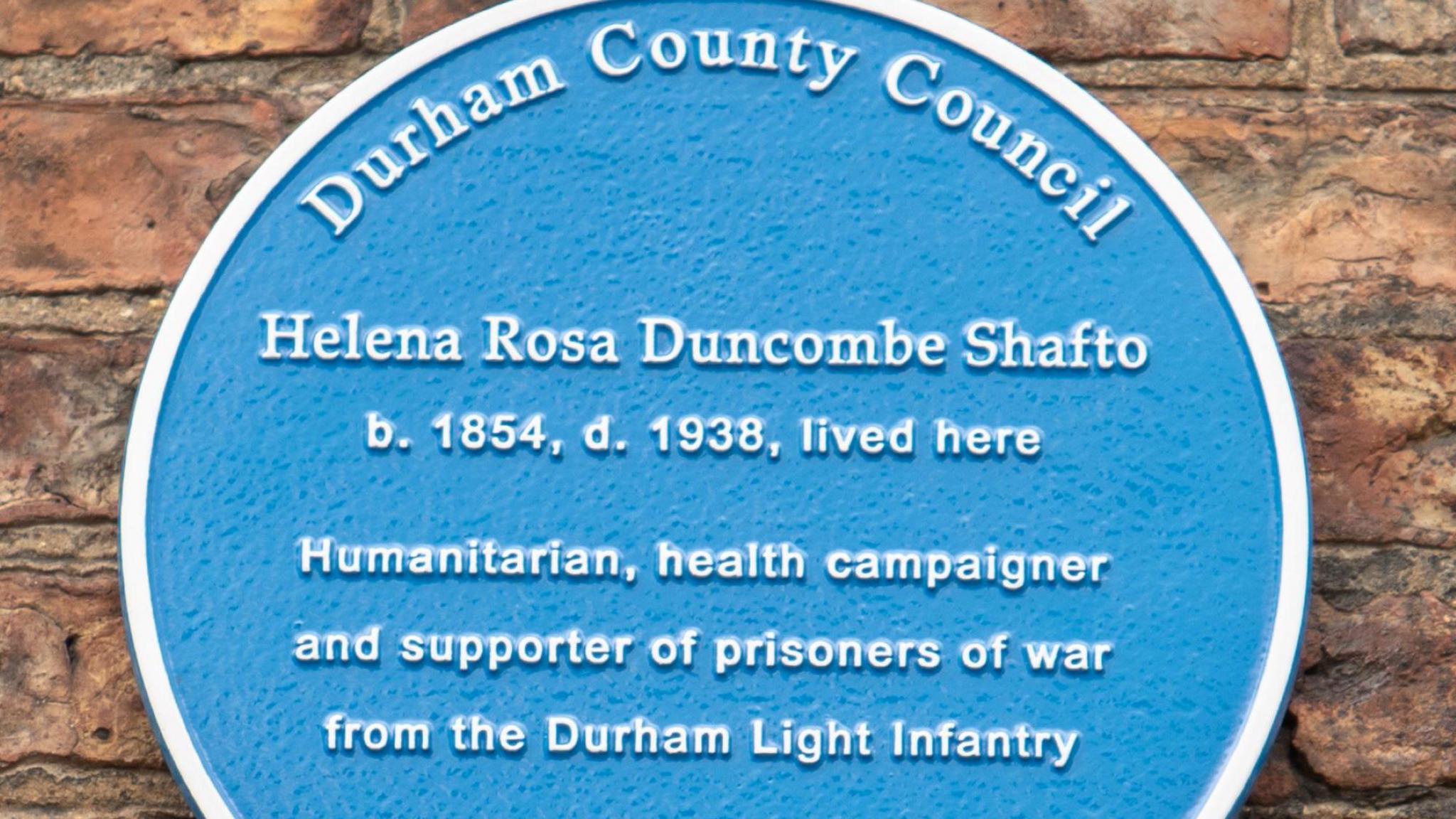 The blue plaque installed on 9 South Bailey in Durham City, where Helena Rosa Duncombe Shafto once lived.