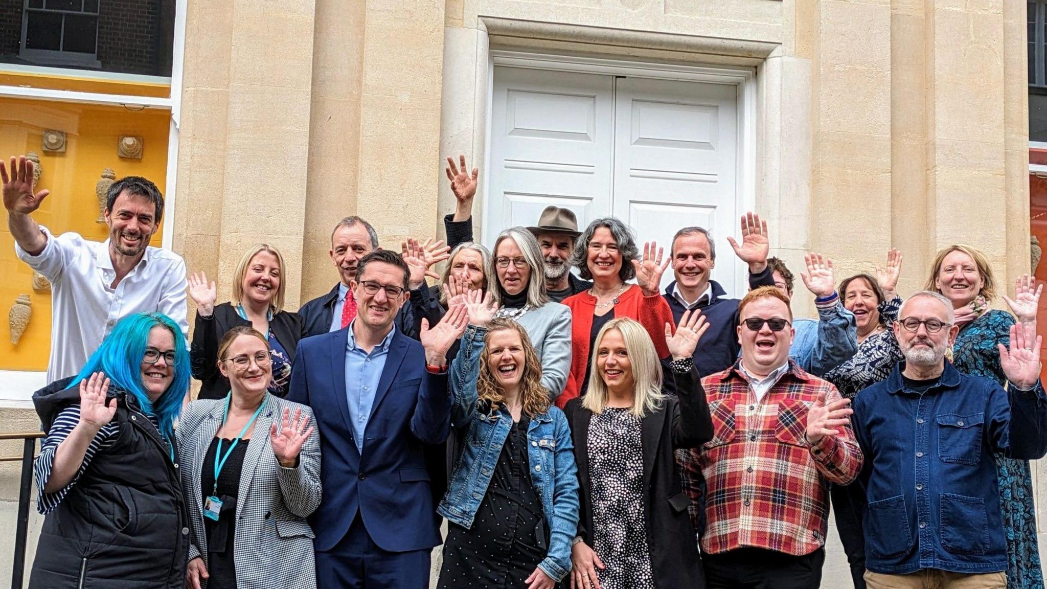 Council leaders and Lowestoft arts and cultural groups outside the former Post Office