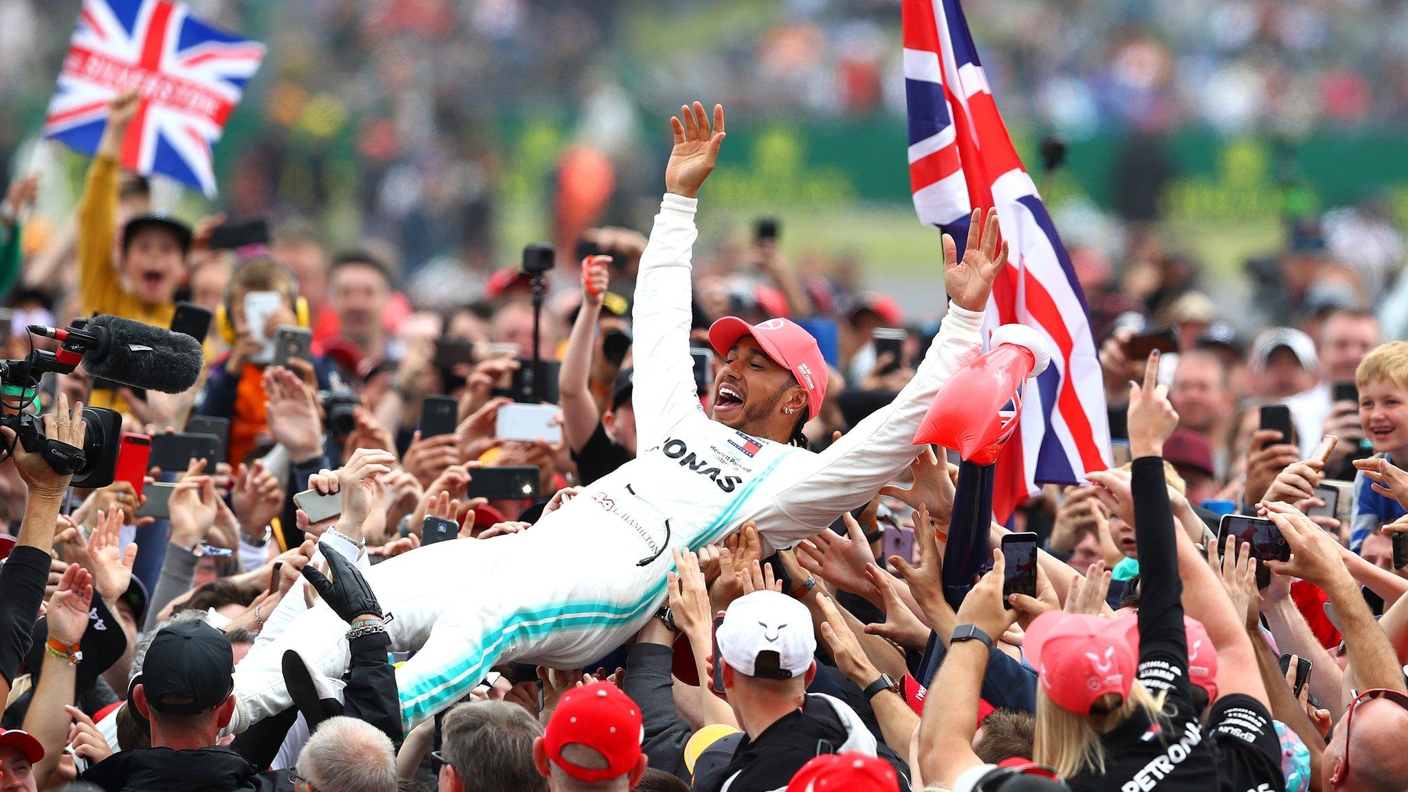 Fans celebrate with Lewis Hamilton at Silverstone