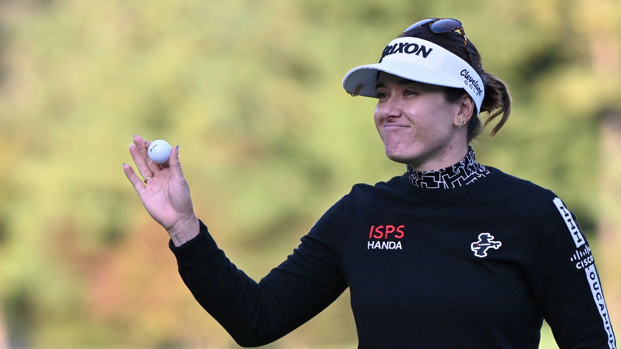 Hannah Green celebrates winning the BMW Ladies Championship