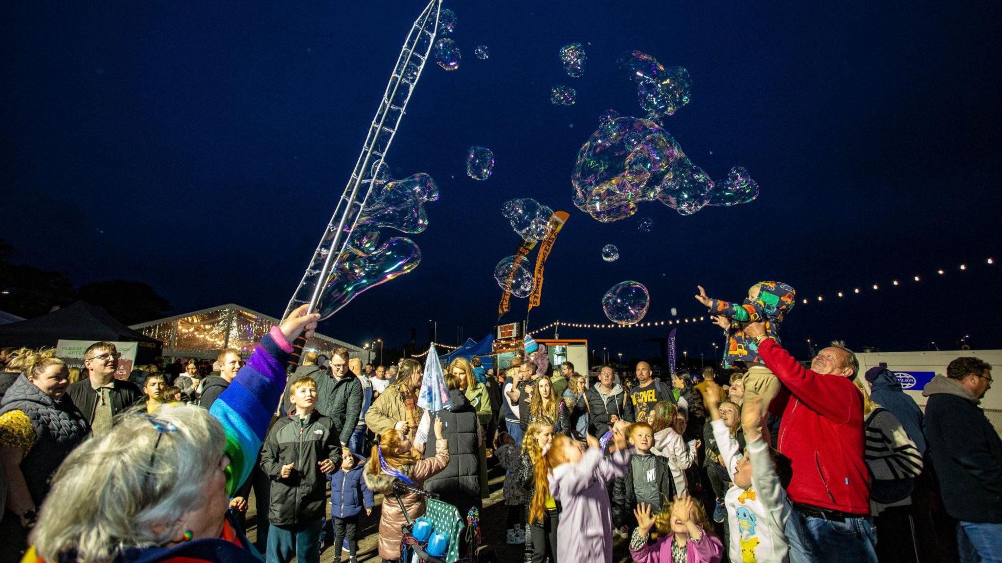 Bubbles being released into the sky in Stranraer