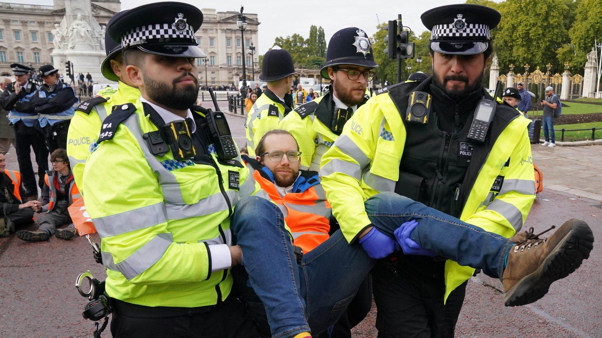 Protestors being removed by police