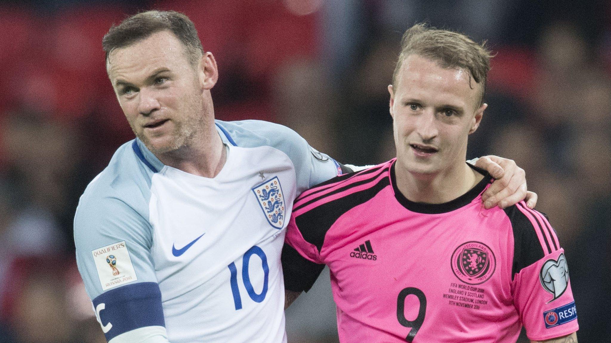 England captain Wayne Rooney with Scotland striker Leigh Griffiths