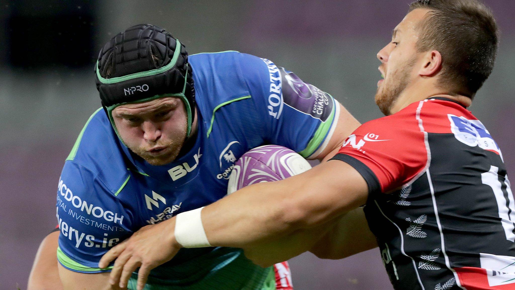 Connacht back-row Eoin McKeon is tackled by Oyonnax wing in Switzeland