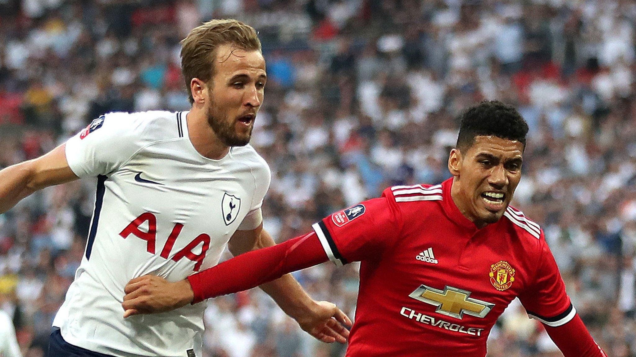 Tottenham striker Harry Kane (left) and Manchester United defender Chris Smalling