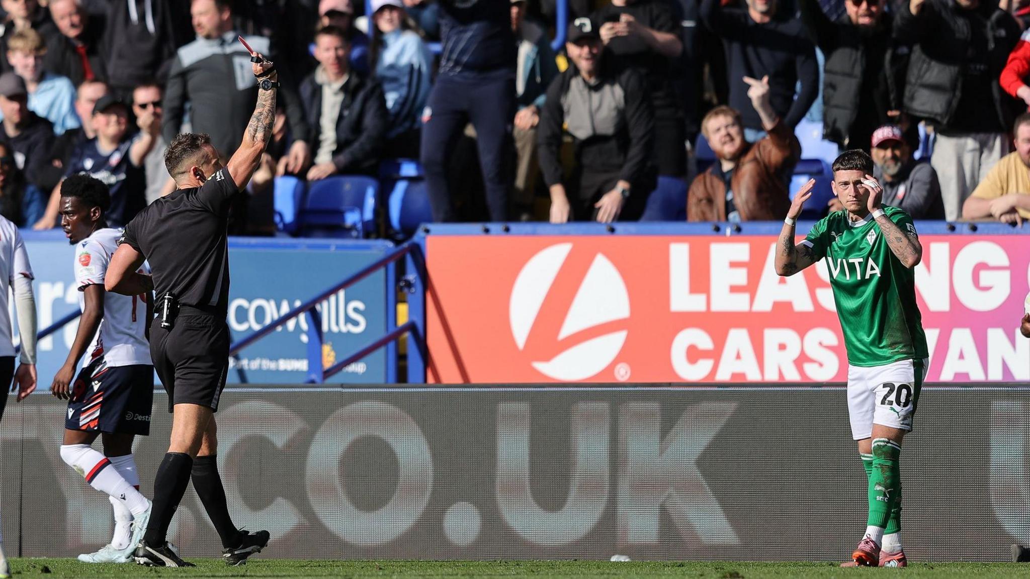 Louie Barry is red carded during Stockport's draw with Bolton on Monday