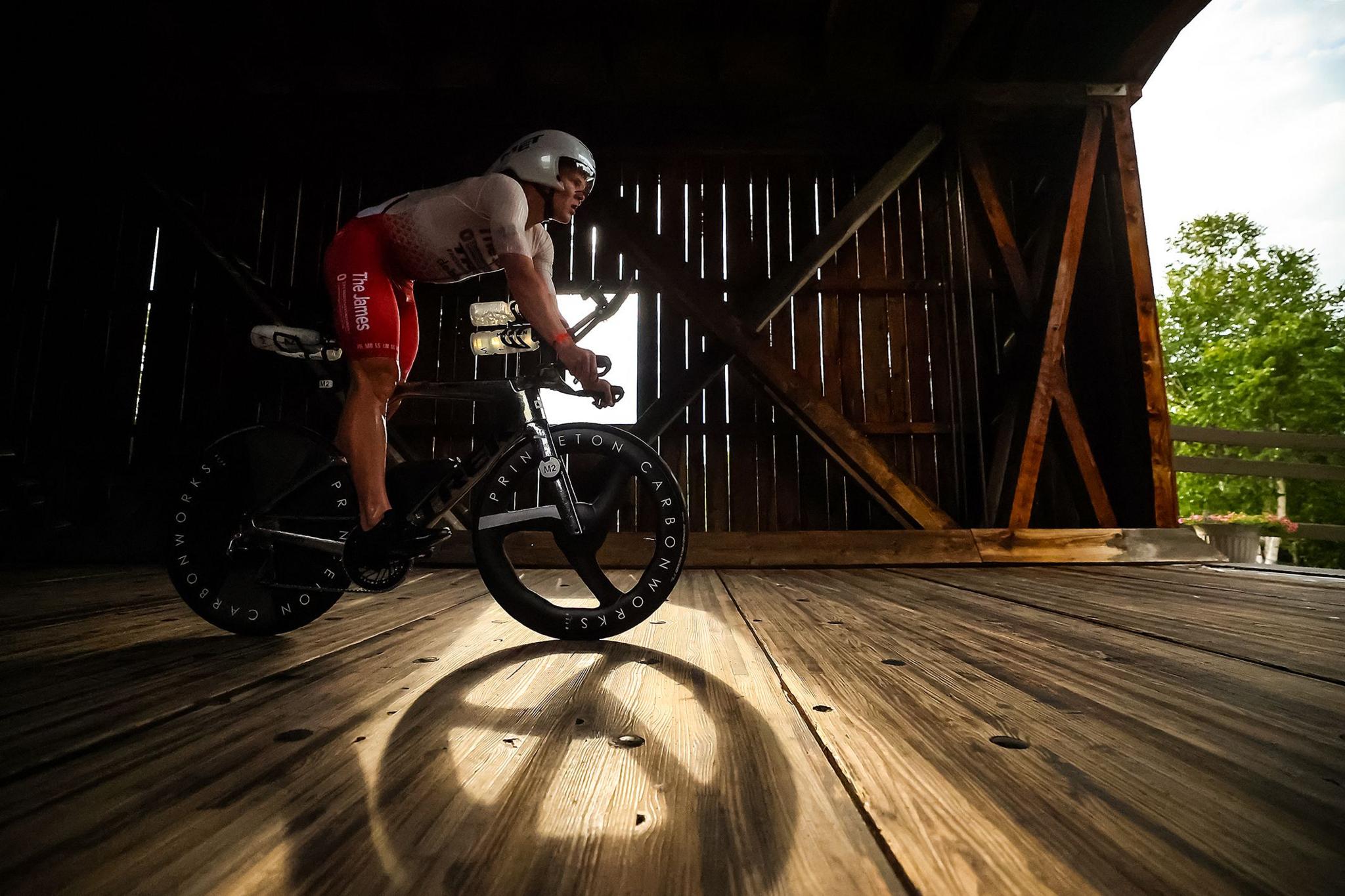 United States' Matthew Marquardt competes in the bike leg as part of the 2025 Athletic Brewing IRONMAN in Lake Placid, New York. Photo by Hector Vivas