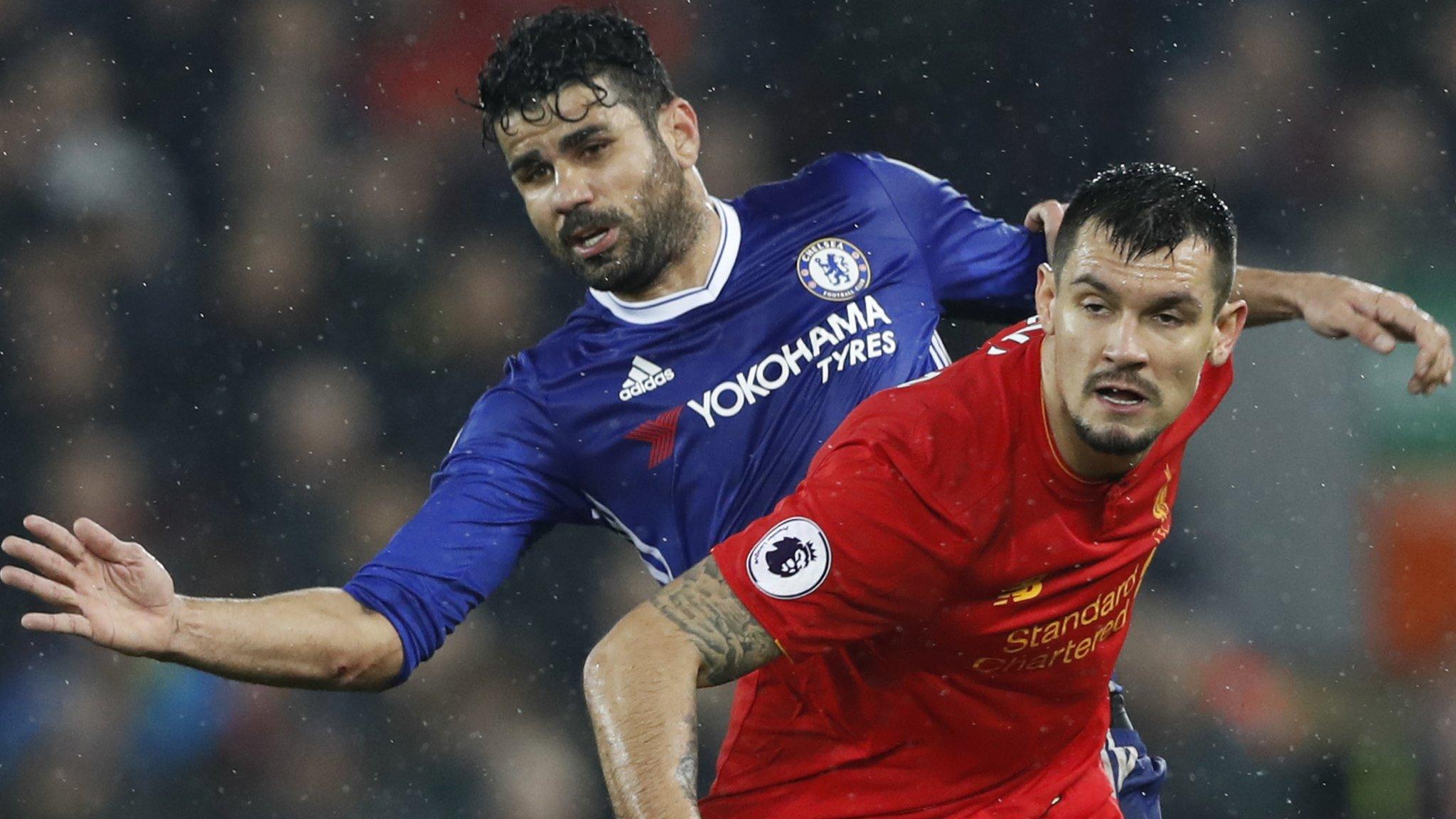 Chelsea forward Diego Costa with Liverpool's Dejan Lovren