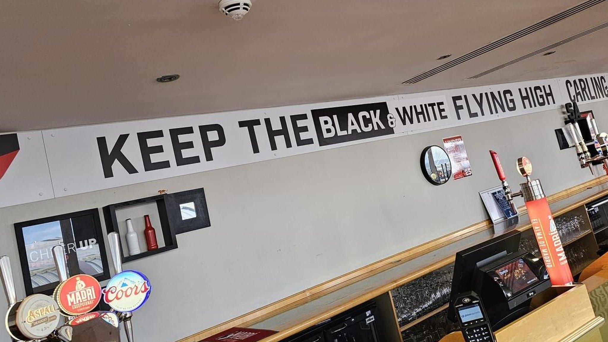 The Black Cats Bar at the Stadium of Light with Newcastle United signage