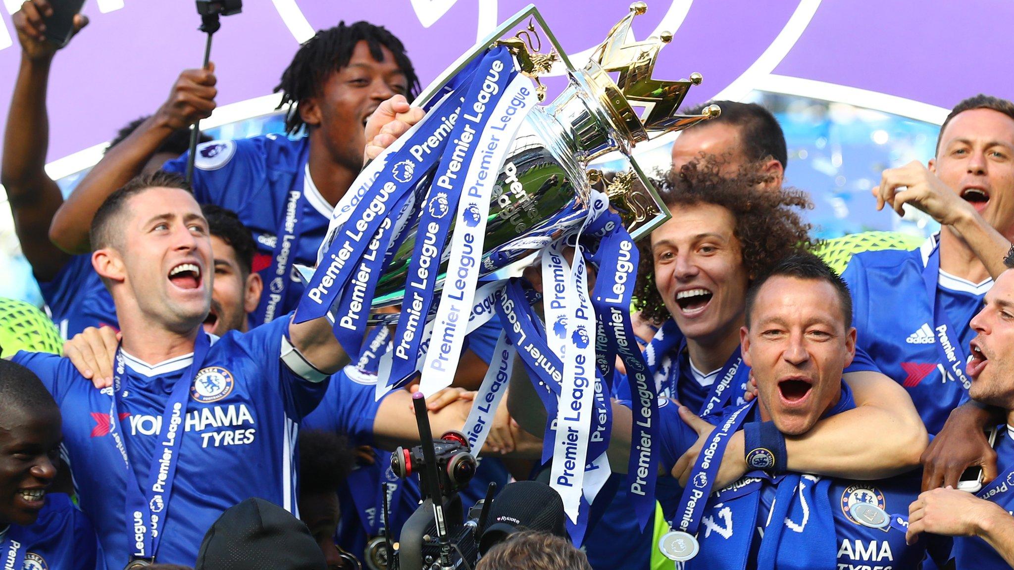 Gary Cahill and John Terry lift the Premier League trophy