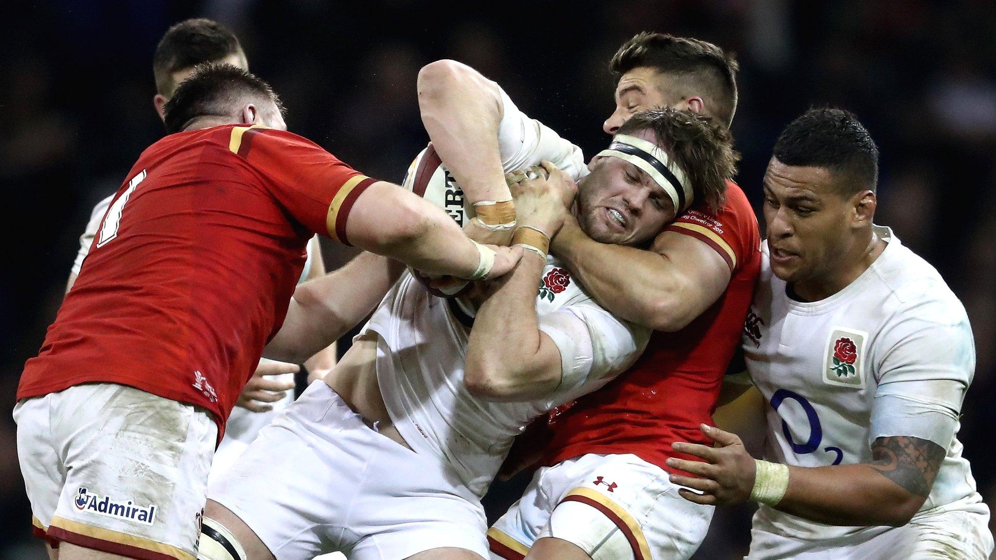 England's Jack Clifford is tackled