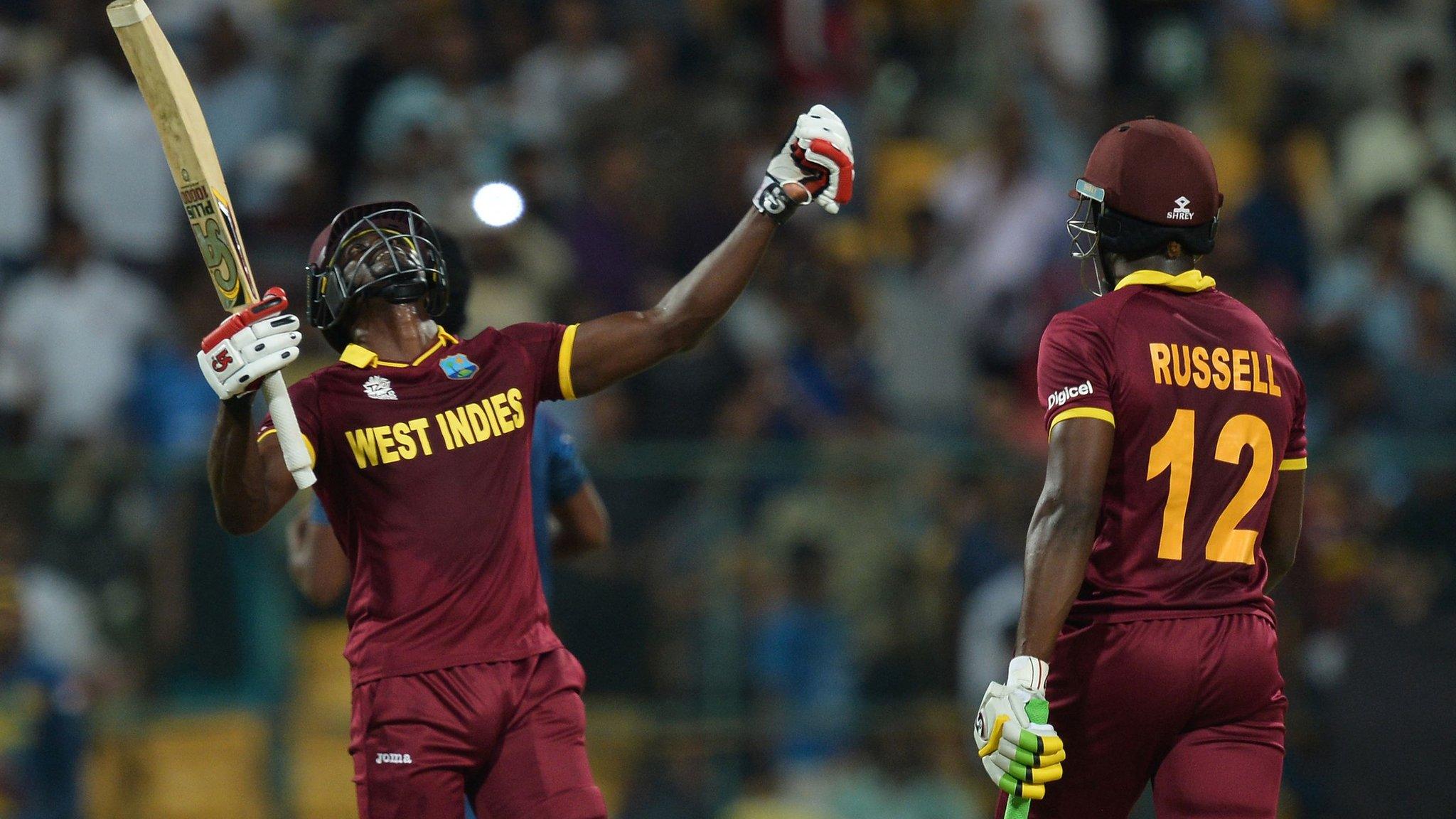 Andre Fletcher celebrates with Andre Russell