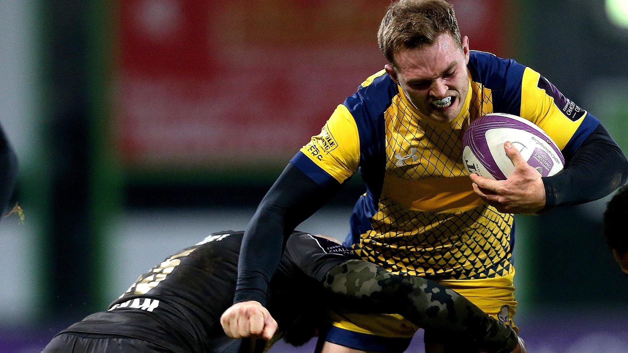 Perry Humphreys of Worcester Warriors is tackled